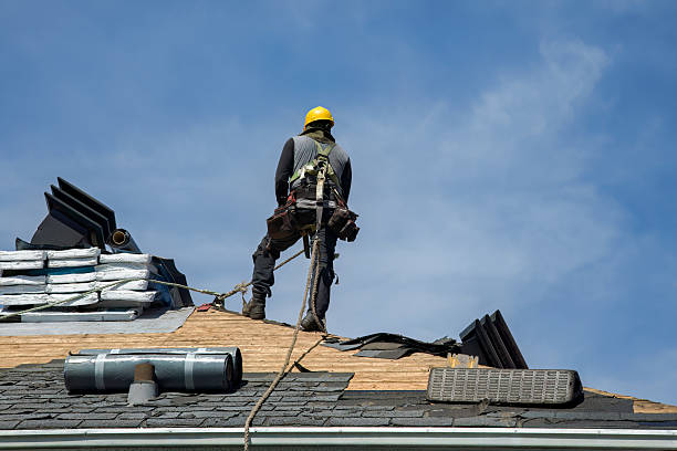 Professional Gutter Installation technician working in Amber, OK